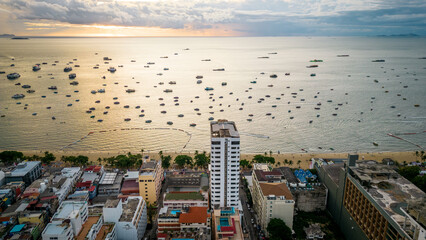 Aerial drone of Pattaya Thailand during sunset beach and city walking street 