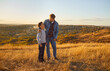 © Studio Romantic - Father and son stand amidst golden yellow field at sunset. Scene depicts picturesque moment shared by father and son evoking warmth of family bonds amidst beauty of nature's embrace Father days.