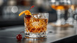 © Matthias - Classic old fashioned cocktail in crystal glass with orange twist and cherry