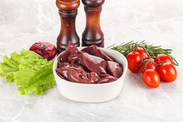 Wall Mural - Raw turkey liver in a bowl ready for cooking