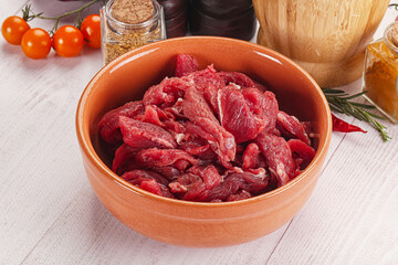 Wall Mural - Raw beef meat - sliced strips