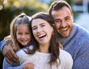 Poster - Laughing, parents and child in park for portrait or bonding together with funny joke, love or smile. Face, father or mother in outdoor nature for support, hug or security with girl, trust or family