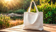 © 9KHOU - Blank white canvas tote bag mockup on a sunlit table, perfect for showcasing designs This eco-friendly product  is perfect for promoting sustainable living simple, and durable design.