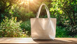 © 9KHOU - Blank white canvas tote bag mockup on a sunlit table, perfect for showcasing designs This eco-friendly product  is perfect for promoting sustainable living simple, and durable design.