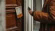 © Sumet - A person looking at a foreclosure notice on their home, holding an empty wallet, with an auction flyer on the door