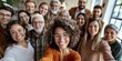 © LukaszDesign - Happy creative group, selfie, and team building at office meeting for photo, memory, or video. hilarious, silly, or humorous people in teamwork smile for hilarious photo or social media at work.