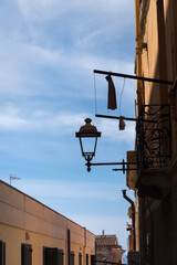 Canvas Print - Old building with a lamp.