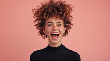 Wall Mural - Happy Young White Woman with Curly Hair, Wearing Black, Excited and Funny, Isolated on Pink Background, Joyful Expression, Playful Portrait, Vibrant Colorful Background, Lively Mood