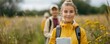 © Intelligent Horizons - Young female student with backpack explores nature and foliage during an outdoor environmental education field trip or nature excursion surrounded by lush greenery and wildflowers