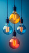 © Анна Терелюк - Colorful Light Bulbs Hanging Against Blue Background
