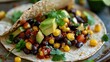 © Sirathee - Delicious Vegan Taco with Black Beans, Corn, Avocado, and Cilantro Filling