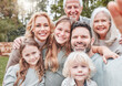 © DavisShared/peopleimages.com - Selfie, children and parents with grandparents in portrait with embrace, bonding or generations outdoor in home. Family, hugging and photography for happy memory, support or love in backyard of house