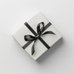 Wall Mural - Gift Box with Black Ribbon on White Background