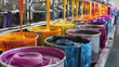 © Oleksandr - Bright textile dyeing baths with bright fabrics in industrial production