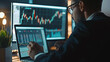 © Mahemud - Financial analytics with a businessman working on charts, highlighting fintech.
