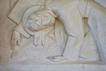 Wall Mural - Jesus falls for the third time. Station IX of the Way of the Cross. Valinhos (Fátima), Portugal.