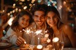 © Akanksha - celebration, holidays and christmas concept - happy family with sparklers having fun at dinner party at home, Generative AI