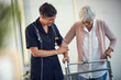 © Leffy/peopleimages.com - Senior woman, walking frame and nurse with support for healing, osteoporosis or stroke recovery in nursing home. Elderly lady, physiotherapy and caregiver help for rehabilitation, care and assistance