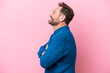 © luismolinero - Middle age caucasian man isolated on pink background in lateral position