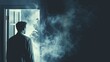 © Artyom - Silhouetted man facing open door with mist seeping into dark room