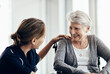 © ReeseArcurs/peopleimages.com - Talking, caregiver and senior woman in wheelchair for assistance, help or medical care in retirement home. Discussion, happy nurse and elderly patient with disability for wellness, support or trust