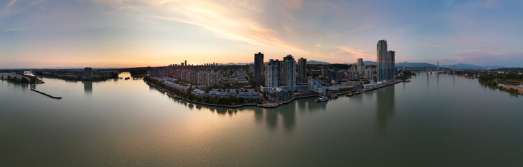 Wall Mural - Panoramic View of City Buildings by river at twilight. New Westmister, Vancouver, BC, Canada