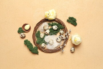 Wall Mural - Composition with Easter quail eggs, baby chickens and wreath on beige background