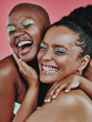 © EmilLL/peopleimages.com - Woman, friends and bold makeup with smile, cosmetic and on pink background. Eyeshadow, embrace and hand for female model person, glam and glow for creative cosmetology and happy aesthetic together