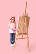 © Pixel-Shot - Cute little girl in beret with brush, paint palette and easel on pink background