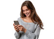 © CozyNessAI - A portrait of a young Caucasian woman looking at her mobile phone and smiling, isolated in a transparent background. Cut out or PNG.