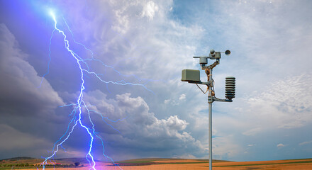 Wall Mural - weather station automatic measurement of weather parameters with stormy sky