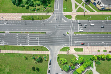 Wall Mural - intersection of the roads in the city. aerial top view from flying drone in sunny summer day.