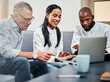 © MollerFinest/peopleimages.com - Working, business people and laptop for meeting with colleagues, diversity or mentorship in office. Team, mature man and technology as web designer, employee or professional for brief or presentation