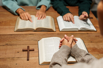 A person reads the Bible, embodying faith and spirituality. The scene reflects a serene moment of contemplation and devotion, highlighting the importance of religion in everyday life.