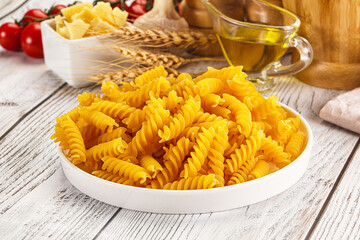 Wall Mural - Italian dry pasta Fussili for bowl