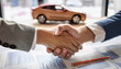 © emerald_media - Agreement of parties by shaking hands, vehicle trade, good luck concept