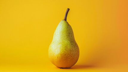 Wall Mural - Fresh pear on vibrant yellow background, studio shot. Minimalistic food photography concept