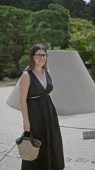 Poster - Joyful and confident, a beautiful hispanic woman in glasses stands by the serene ginkaku-ji temple, her cheerful smile embracing the beauty of kyoto's zen garden