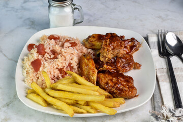 Wall Mural - chicken wings  with fries and rice