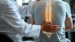 © mirifadapt - chiropractor adjusting a patient's spine to alleviate back pain