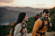 © La Famiglia - Loving mid aged couple with a backapacks hiking on the hills together