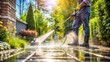 © Stock Spectrum - Low Angle View of a Man Power Washing a Patio, power washing, patio cleaning, outdoor cleaning, pressure washing
