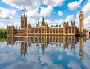 Canvas Print - Houses of Parliament and Big Ben tower reflected in Thames river, London, UK