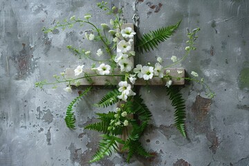 Sticker - Delicate arrangement of white flowers and ferns laid on a vintage, grey textured backdrop