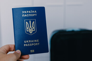 Ukrainian biometric passport in woman hand 