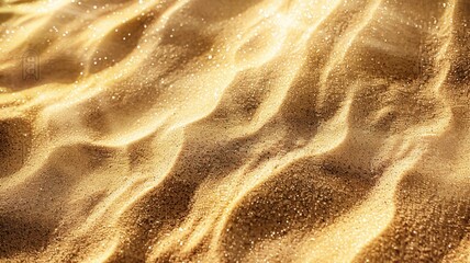 Wall Mural - Sunlight shimmering on golden beach sand with ripples