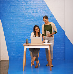 Poster - Laptop, discussion and business women by wall for teamwork with copywriting startup company. Computer, creative career and female journalists working on online article in collaboration in office.