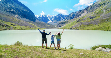 Wall Mural - Happy family in the mountains 