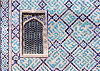 Naklejka na meble Window with tile decor on wall of Sher-dor Madrassah (Sher Dor (Lion) Medressa), Registan complex, Samarkand, Uzbekistan