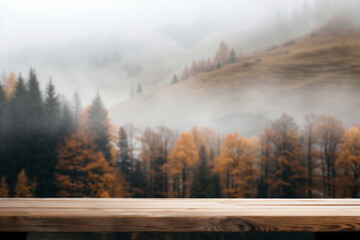 Poster - Empty wooden table against a misty autumn forest backdrop, with blurred trees and foliage in yellow, orange, and green, perfect for product placement
